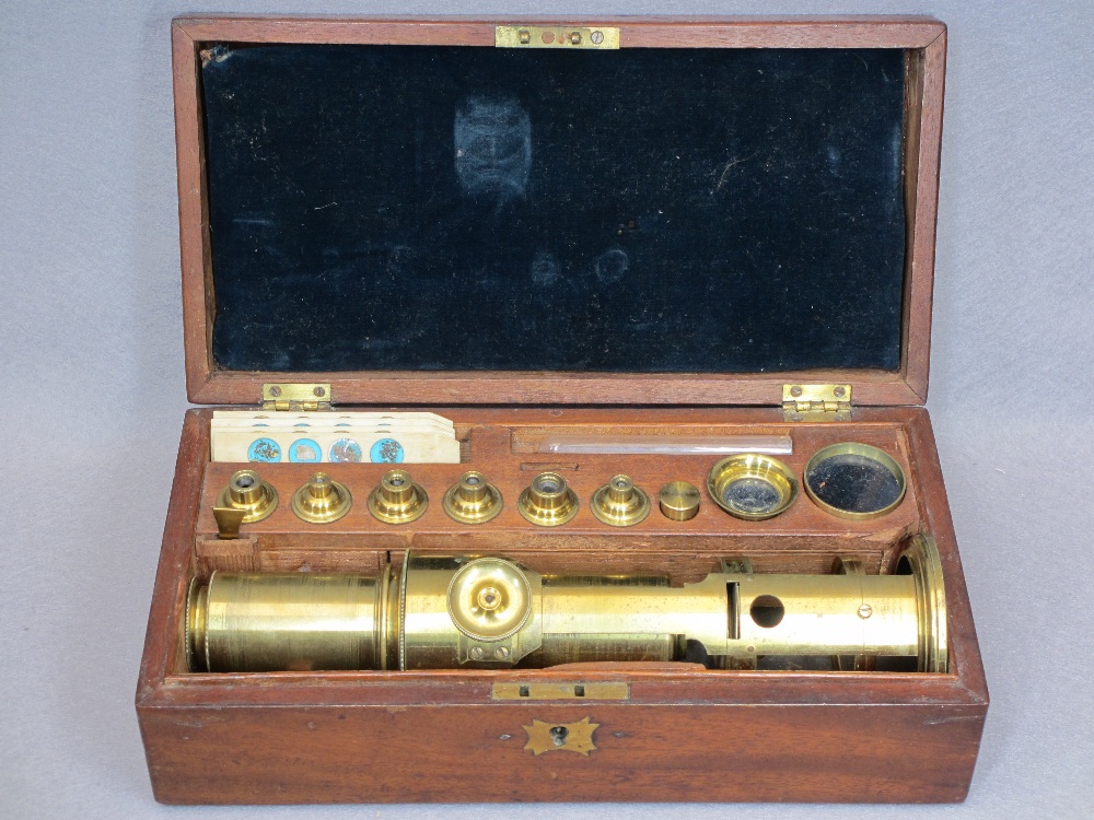 BRASS FIELD MICROSCOPE IN MAHOGANY CASE - fitted interior with additional lenses, bone slides,