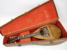 TORTOISE SHELL MOUNTED MANDOLIN IN FITTED LEATHER CASE