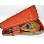 TORTOISE SHELL MOUNTED MANDOLIN IN FITTED LEATHER CASE