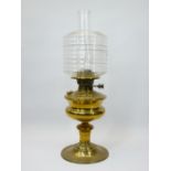 VICTORIAN BRASS OIL LAMP - with clear glass ribbed shade, the wick turners marked 'British Made',