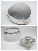 A SILVER RING BOX - oval to a narrowing front with three scrolled supports, 4.5ozs, Birmingham 1913,