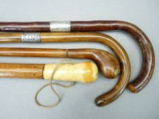 ANTIQUE & LATER WALKING STICKS & CANES (4) including a Malacca example with possibly walrus ivory