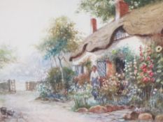 J HUGHES CLAYTON watercolour - thatched cottage with woman in the garden, signed lower left, 28 x