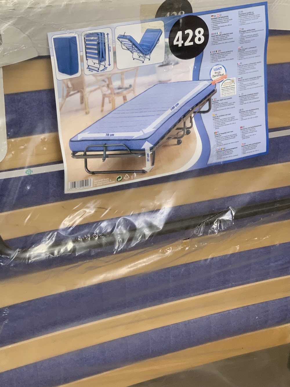 'AS NEW' STILL PACKAGED FOLDING GUEST BED WITH PROTECTIVE COVER