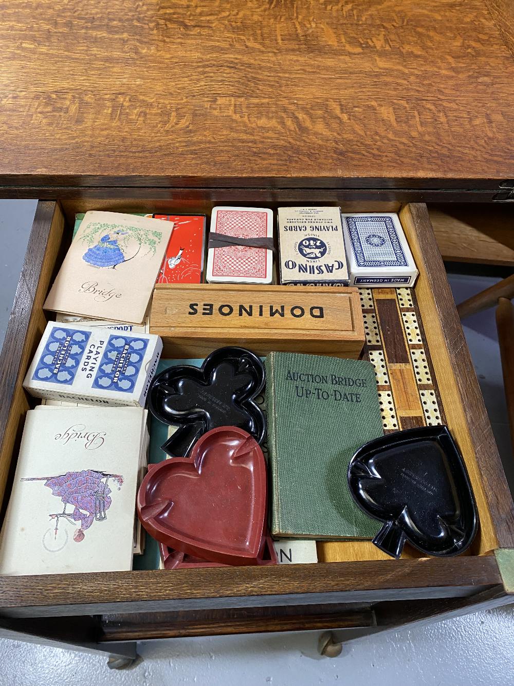 POLISHED OBLONG TROLLEY - two shelf with foldover baize top with a quantity of playing cards etc - Image 3 of 3