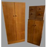 BEDROOM FURNITURE by EG - a neat two door light wood wardrobe with interior hanging space to one