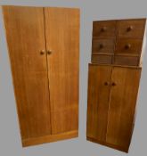 BEDROOM FURNITURE by EG - a neat two door light wood wardrobe with interior hanging space to one