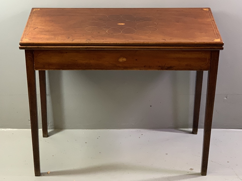 FOLDOVER CARD TABLE - circa 1830, mahogany with Sheraton style fan inlays and boxwood stringing,