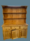 FARMHOUSE PINE STYLE DRESSER having a two shelf rack over a three drawer and three door base, 177cms