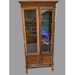 VINTAGE BOOKCASE CUPBOARD - two glazed doors over two cupboard doors, the upper section with three