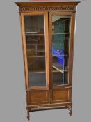 VINTAGE BOOKCASE CUPBOARD - two glazed doors over two cupboard doors, the upper section with three