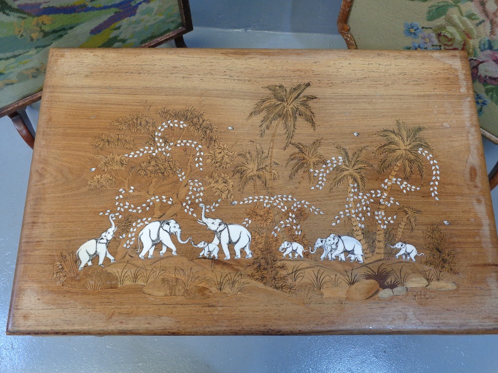 LONG JOHN COFFEE TABLE with inlaid top depicting elephants and palm trees, 39cms H, 76cms W, 50cms D