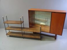 G-PLAN STYLE BOOKCASE CUPBOARD, mid Century having sliding glass doors and a single wooden door,