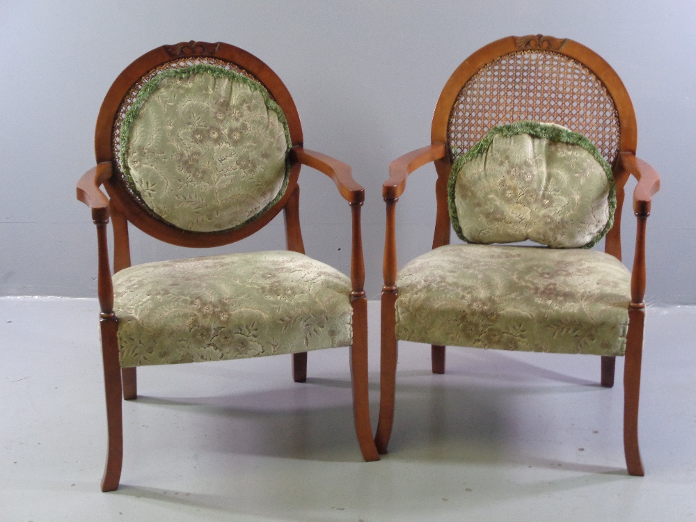 ORNATE ELBOW CHAIRS - a pair, walnut with cane backs