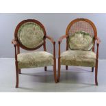 ORNATE ELBOW CHAIRS - a pair, walnut with cane backs