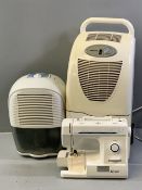 AMCOR TROLLEY DEHUMIDIFIER, a Delonghi portable dehumidifier and a modern electric sewing machine