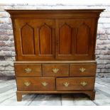 19TH CENTURY WELSH OAK PRESS CUPBOARD, shaped cornice above pointed arch panelled doors, on a