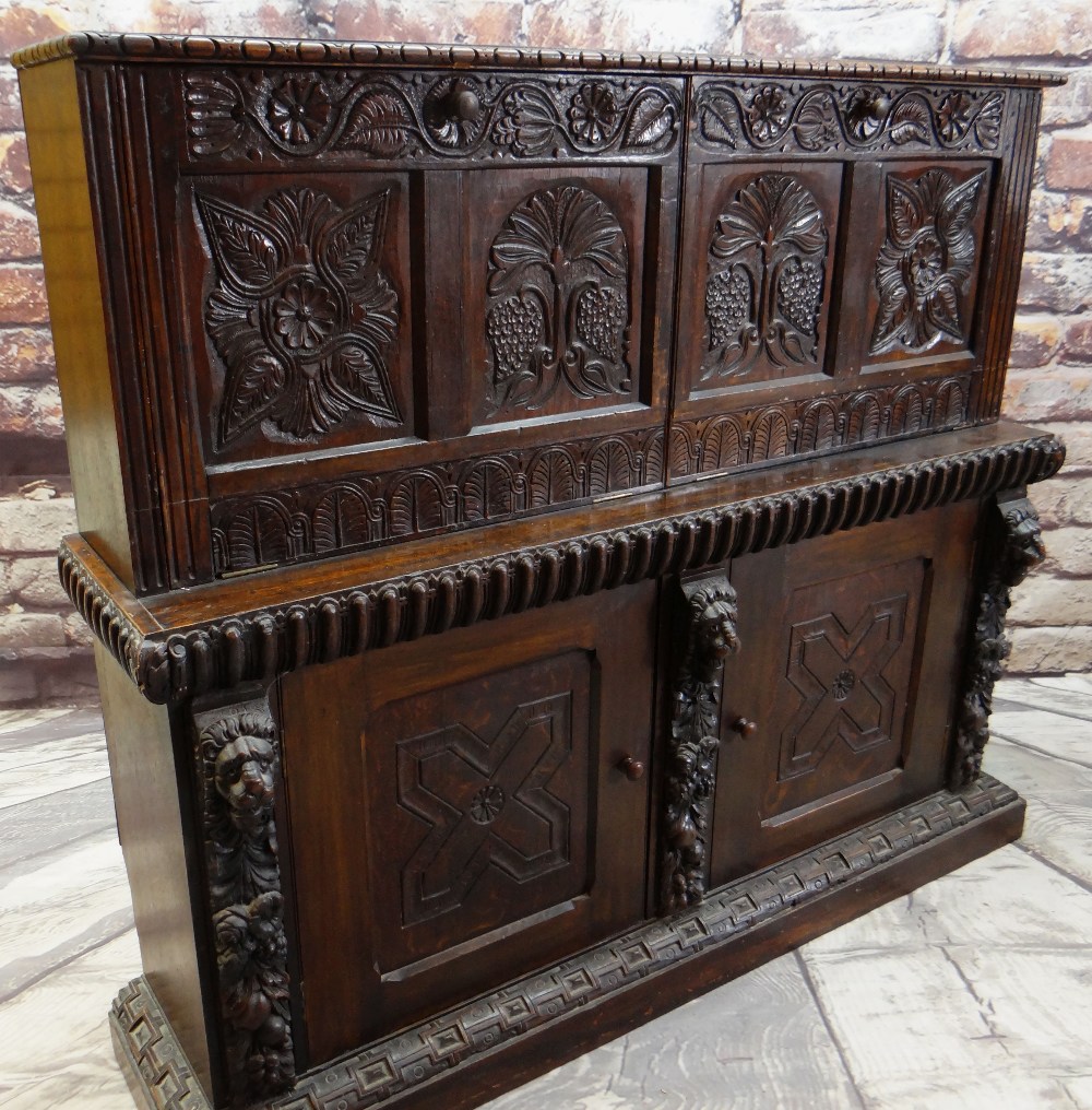 ANTIQUE CARVED OAK SIDE CABINET, decorated with the 17th Century style, the top adapted form a