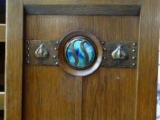 ARTS & CRAFTS OAK PART WARDROBE, possibly by Shapland & Petter, the panelled oak door with