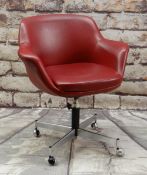 MODERN DESK CHAIR, with simulated red leather upholstery, on chromed swivel support and castors,