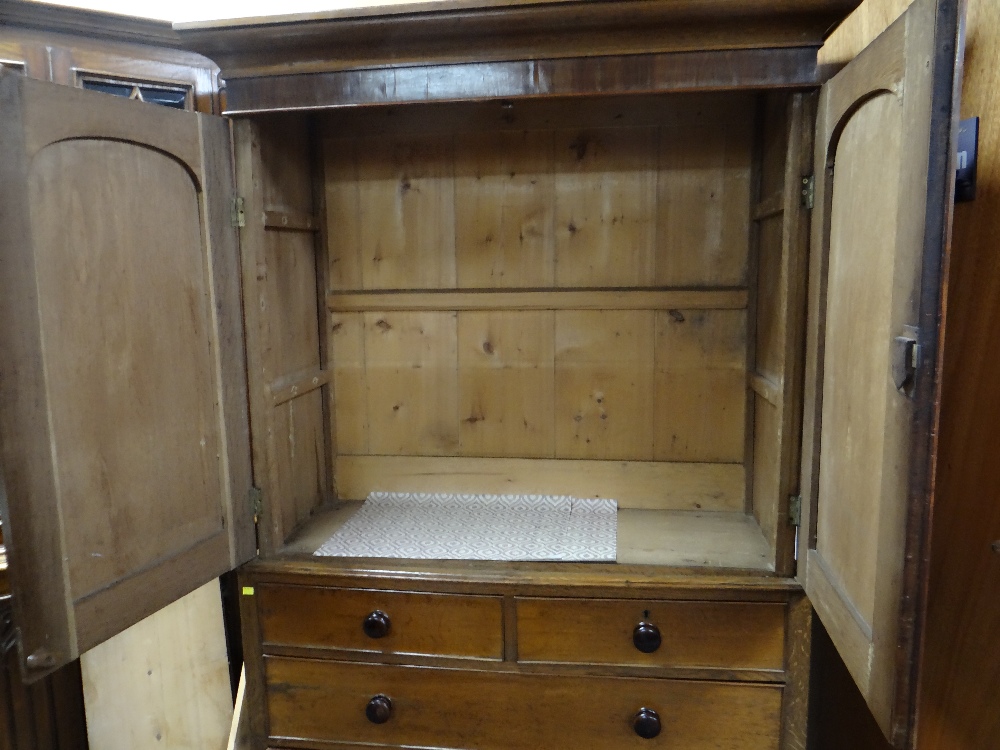 VICTORIAN OAK & MAHOGANY LINEN PRESS, ogee cornice and plain frieze above arched panelled doors, - Image 4 of 13