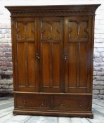 CAROLEAN-STYLE OAK TRIPLE WARDROBE, c. 1920, cavetto dentil cornice above panelled doors and 2