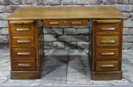 1930s OAK PEDESTAL DESK, fitted with slides and drawers to each plinth, panelled sides and front,