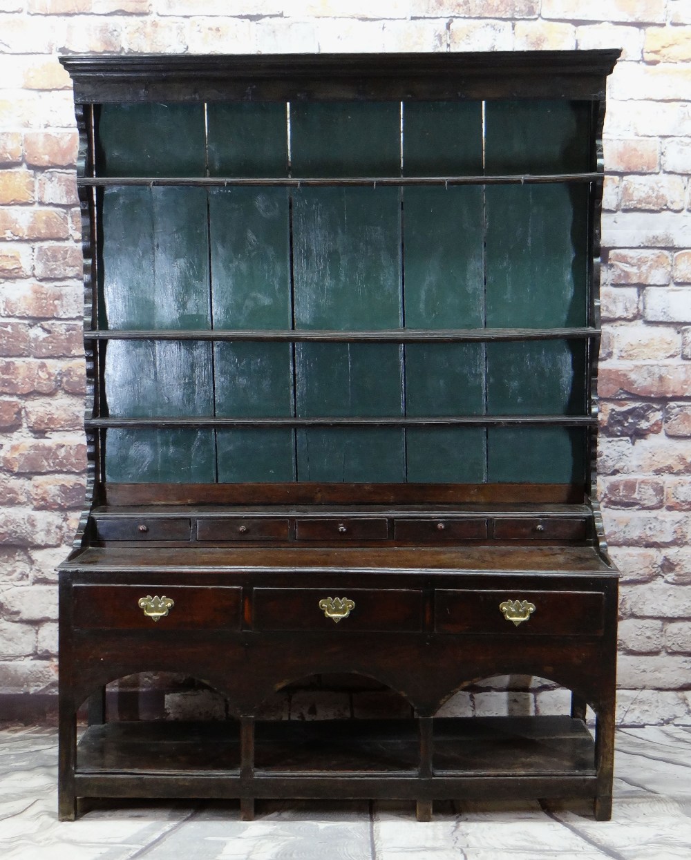 18TH CENTURY JOINED OAK WELSH DRESSER, probably Carmarthenshire, later painted boarded rack with