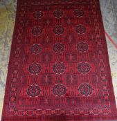 AFGHAN KHAL MOHAMMADI RUG, red allover geometric floral field within flowerhead link border and flow