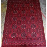 AFGHAN KHAL MOHAMMADI RUG, red allover geometric floral field within flowerhead link border and flow