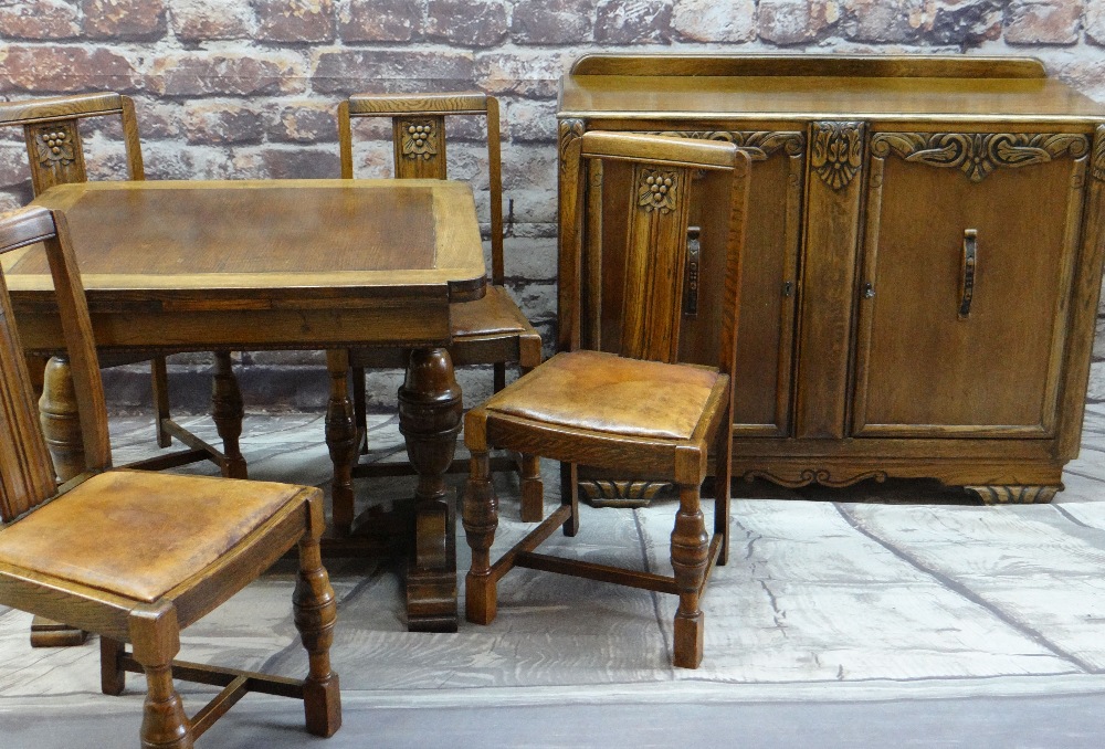 REPRODUCTION ELIZABETHAN STYLE CARVED OAK DINING SUITE comprising draw leaf dining table, four