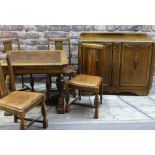 REPRODUCTION ELIZABETHAN STYLE CARVED OAK DINING SUITE comprising draw leaf dining table, four
