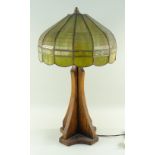 ARTS & CRAFTS MISSION-STYLE OAK TABLE LAMP, domed segmented green glass shade on a cruciform section