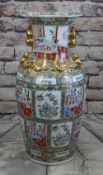 LARGE MODERN CHINESE CANTON FAMILLE ROSE FLOOR VASE, gilt handles, panels decorated with Manchu