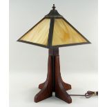 ARTS & CRAFTS MISSION-STYLE OAK TABLE LAMP, with pyramidal opaque glass shade, on a cruciform