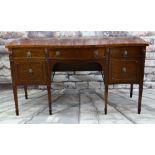 GEORGE III-STYLE SERPENTINE MAHOGANY SIDEBOARD, shaped top above two frieze drawers, cellarette
