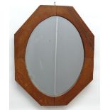 ARTS & CRAFTS-STYLE OAK MIRROR, octagonal; with oval plate, 74.5cm high