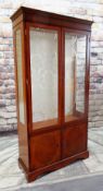 MODERN DISPLAY CABINET, with oval panelled doors below, glass shelves, 96 x 38 x 187cms Condition: