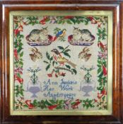 19TH CENTURY SAMPLER depicting birds, seated cats on cushions, hare heads, floral vases, all