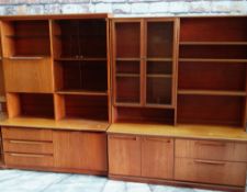 TWO MID-CENTURY TEAK LOUNGE UNITS, both fitted with glazed cupboards and drawers, and a walnut co