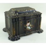 VICTORIAN PAPIER MACHE TEA CADDY, japanned, mother of pearl inlaid and gilt decoration, shaped