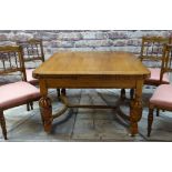 ELIZABETHAN-STYLE GOLDEN OAK DRAW-LEAF DINING TABLE & FOUR SIMILAR CHAIRS, moulded edge and carved