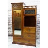 ARTS & CRAFTS-STYLE MAHOGANY WARDROBE / COMPACTUM, with mirrored door, floral carved frieze, gilt