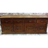 ANTIQUE CARVED OAK DRESSER BASE, top with low back rail above reeded frieze and four drawers, carved