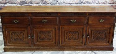 ANTIQUE CARVED OAK DRESSER BASE, top with low back rail above reeded frieze and four drawers, carved