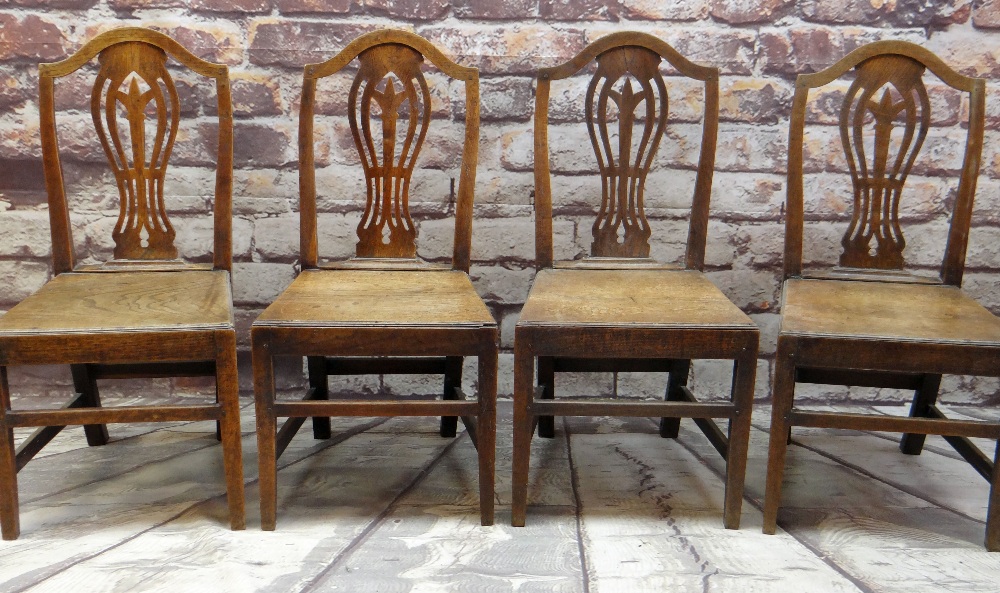 SET OF FOUR EARLY 19TH CENTURY OAK SIDE CHAIRS with pierced vase splats, tapering solid seats and