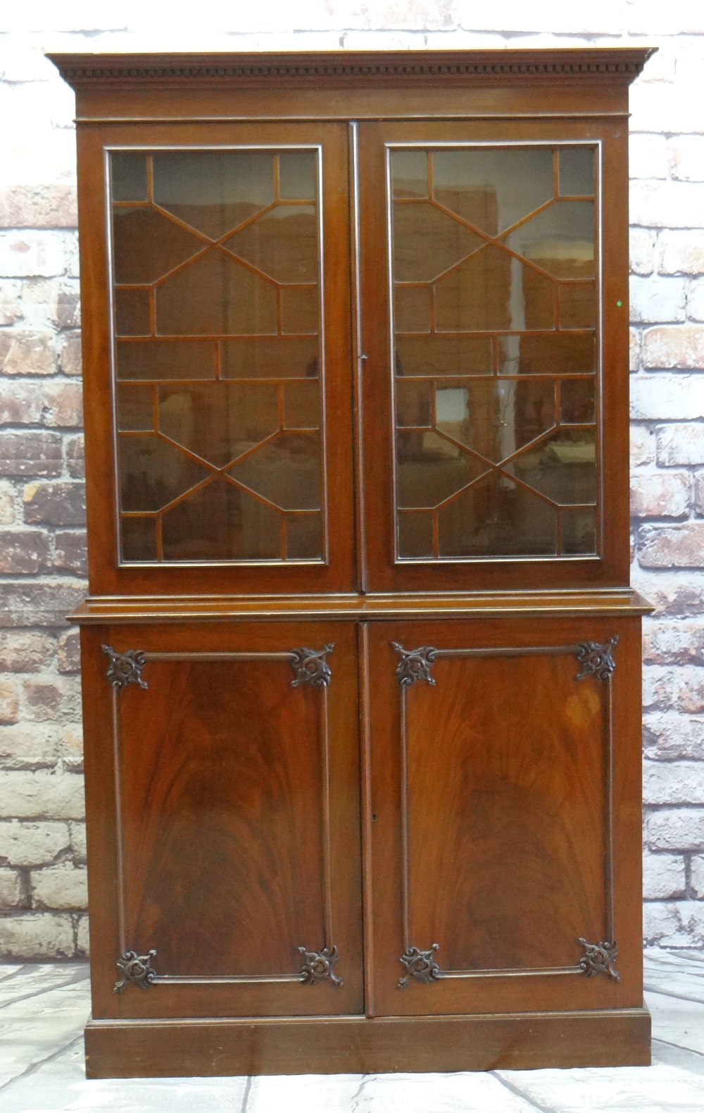 GEORGE III-STYLE MAHOGANY BOOKCASE with dentil cornice, astragal glazed doors, adjustable shelv