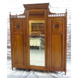 LATE VICTORIAN AESTHETIC-STYLE MAHOGANY TRIPLE WARDROBE / COMPACTUM, a foliate carved doors with