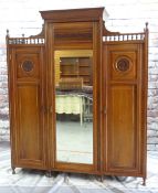 LATE VICTORIAN AESTHETIC-STYLE MAHOGANY TRIPLE WARDROBE / COMPACTUM, a foliate carved doors with