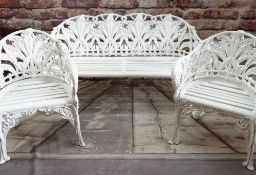 THREE-PIECE PAINTED METAL 'LILY OF THE VALLEY' GARDEN SUITE, in the style of Coalbrookedale,